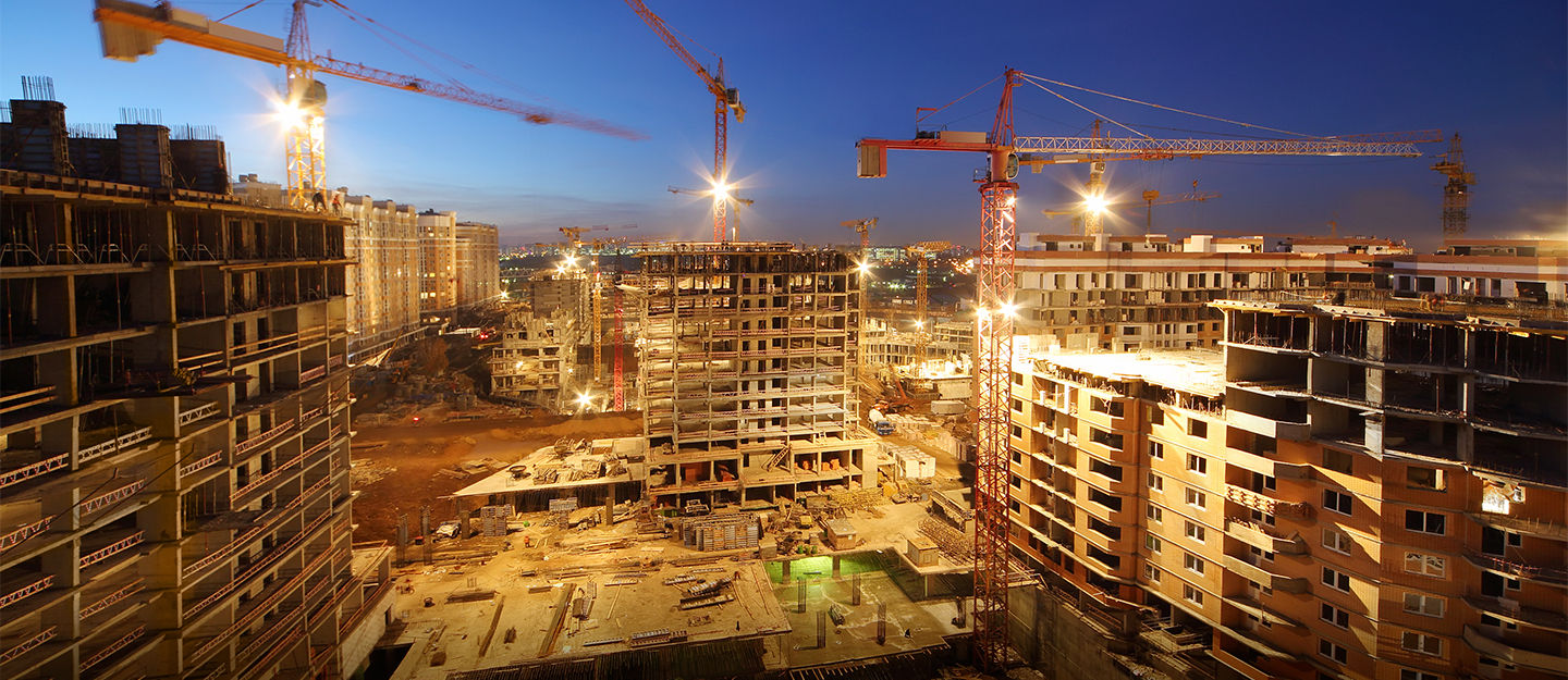 Tower cranes on a residential high-rise