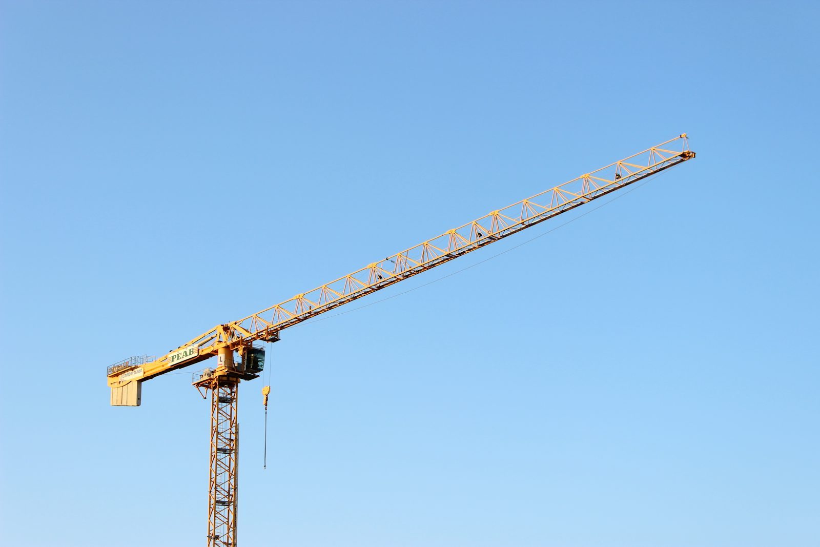 Tower crane against a clear sky
